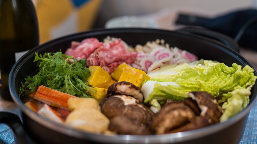 cooked food on black ceramic bowl