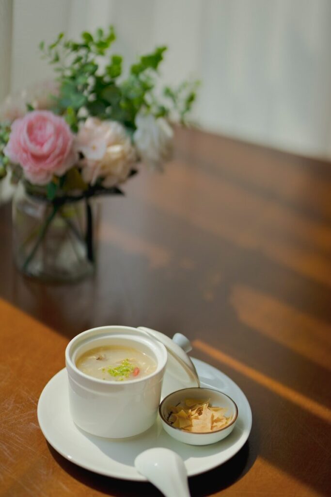 white ceramic mug on white ceramic saucer