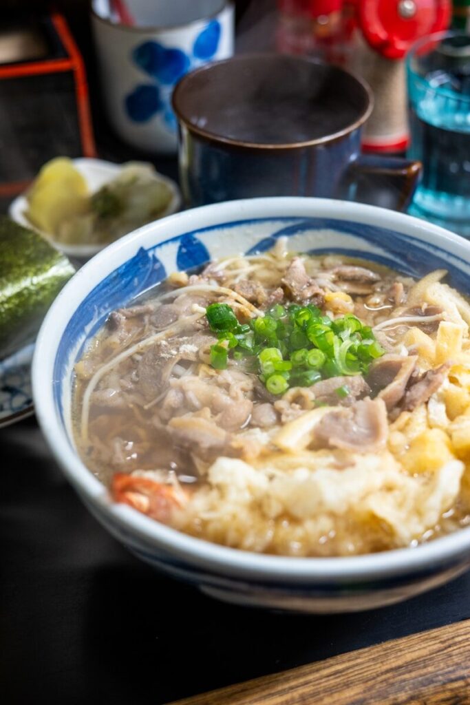 A bowl of food sitting on top of a table